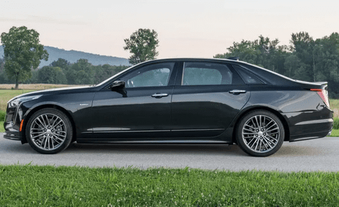 A side profile shot of a sleek black luxury sedan, ideal for VIP airport transfers and private car services during the 2026 World Cup